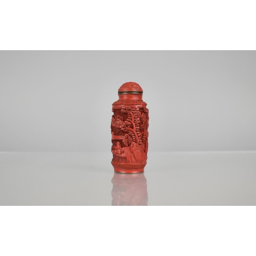 155 - A Cinnabar Lacquer and Gilt Metal Snuff Bottle of Cylindrical Form decorated with Figures in River a... 