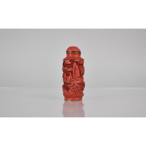 155 - A Cinnabar Lacquer and Gilt Metal Snuff Bottle of Cylindrical Form decorated with Figures in River a... 