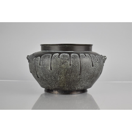 179 - A Chinese Bronze Gui Censer, the Baluster Shaped Body Cast in Relief with Lion Mask Handles and Drip... 