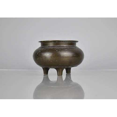 180 - A Chinese Bronze Tripod Censer, 9cm High