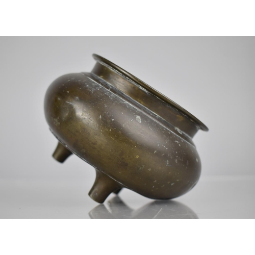 180 - A Chinese Bronze Tripod Censer, 9cm High