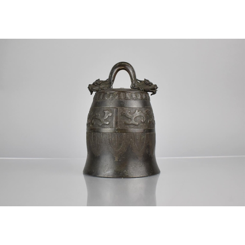 183 - A Chinese Bronze Bell of Archaic Form Having Twin Head Dragon Loop Surmounting Domed Bell Body with ... 