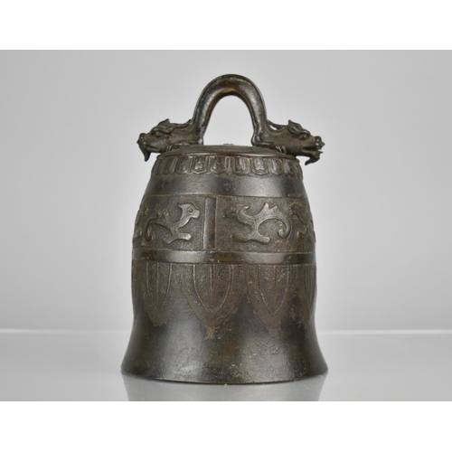 183 - A Chinese Bronze Bell of Archaic Form Having Twin Head Dragon Loop Surmounting Domed Bell Body with ... 