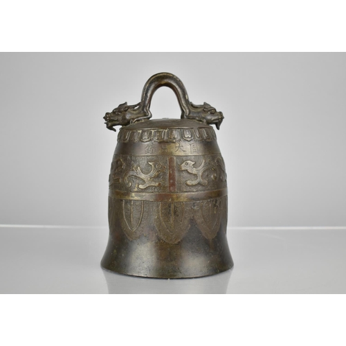 183 - A Chinese Bronze Bell of Archaic Form Having Twin Head Dragon Loop Surmounting Domed Bell Body with ... 