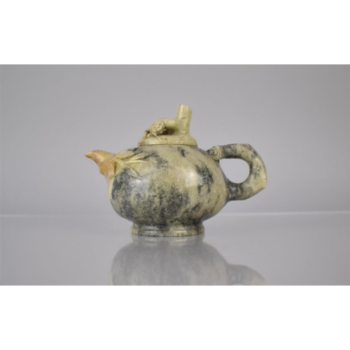 134 - A Chinese Carved Soapstone Teapot with Bamboo Stylised Handles, Spout and Finial, 10cm high