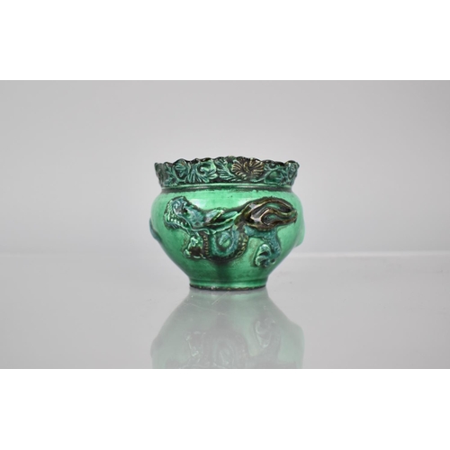 108 - A Chinese Pottery Green Glazed Pot decorated in Relief with Dragon, 6.5cms High