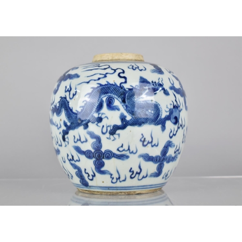 31 - A Chinese Porcelain Blue and White Crackle Glazed Ginger Jar Decorated with Dragon and Phoenix Among... 