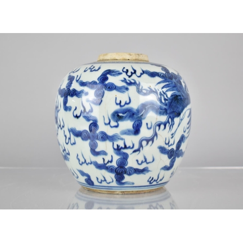 31 - A Chinese Porcelain Blue and White Crackle Glazed Ginger Jar Decorated with Dragon and Phoenix Among... 