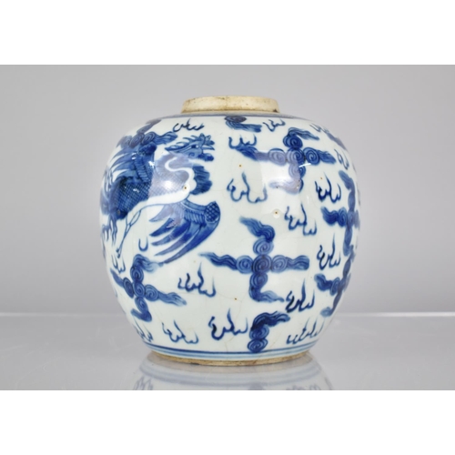 31 - A Chinese Porcelain Blue and White Crackle Glazed Ginger Jar Decorated with Dragon and Phoenix Among... 