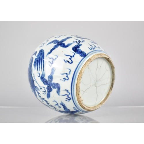 31 - A Chinese Porcelain Blue and White Crackle Glazed Ginger Jar Decorated with Dragon and Phoenix Among... 