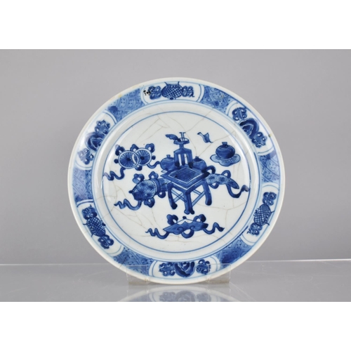 6 - A Chinese Porcelain Blue and White Crackle Glazed Plate Decorated with Precious Objects, Scrolls Etc... 