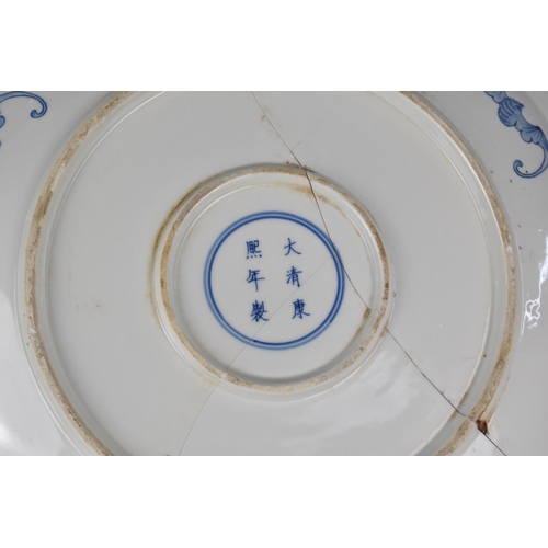 7 - A Large Chinese Porcelain Blue and White Charger decorated with Antique Vases of Flowers, Precious O... 