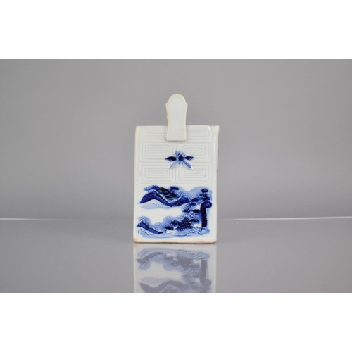 39 - A Chinese Blue and White Porcelain Water Dropper of Square Form, The Panelled Sides Decorated in Sha... 