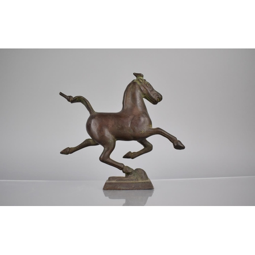 173 - A Chinese Cast Bronze Study of The Flying Horse of Gansu, 18cms High. Condition: Not Perfect with Sp... 