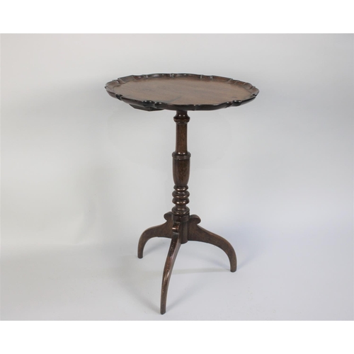 218 - An Early George III Mahogany Tripod Wine Table with a Carved Pie Crust Top over a Turned Stem and Th... 