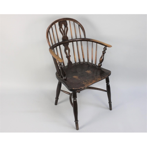 367 - An Early 19th Century Windsor Arm Chair with a Low Hooped Back over Pierced Splats, Solid Elm Seat, ... 