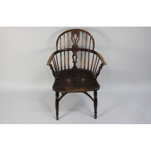 367 - An Early 19th Century Windsor Arm Chair with a Low Hooped Back over Pierced Splats, Solid Elm Seat, ... 