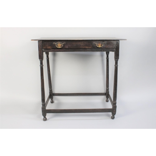 195 - An Early 18th Century Country Made Oak Side Table with a Solid Plank Top Over a Frieze Drawer, Suppo... 