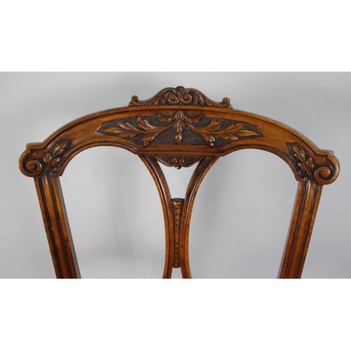 368 - A Pair of 19th Century Walnut Side Chairs with Carved and Pierced Backs, Upholstered Seats and Suppo... 