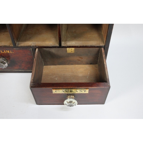 219 - A Bank of 19th Century Apothecary Shop Pigeon Holes and Three Drawers with Glass Knobs, 23x101x73cms... 