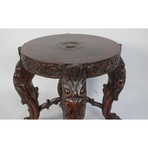 253 - A 19th Century Anglo-Indian Padouk Wood Jardiniere Stand with a Solid Top Supported on Four Profusel... 