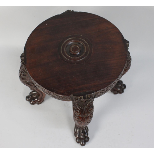 253 - A 19th Century Anglo-Indian Padouk Wood Jardiniere Stand with a Solid Top Supported on Four Profusel... 