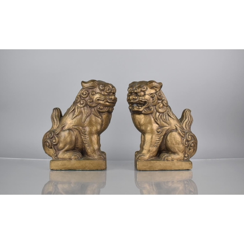 185 - A Pair of Two Heavy Gilt Cast Plaster Studies of Temple Lions, 25cms High