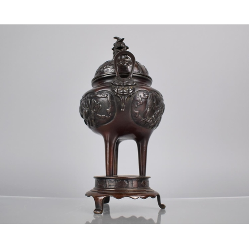 178 - A Japanese Bronze Koro of Squat Bellied Form, Raised on Tapering Tripod Supports and Circular Base. ... 