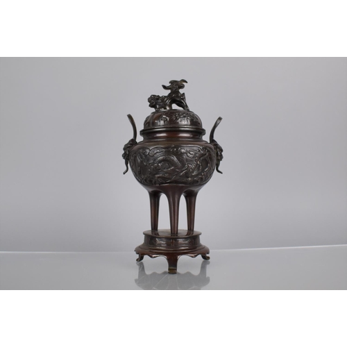 178 - A Japanese Bronze Koro of Squat Bellied Form, Raised on Tapering Tripod Supports and Circular Base. ... 