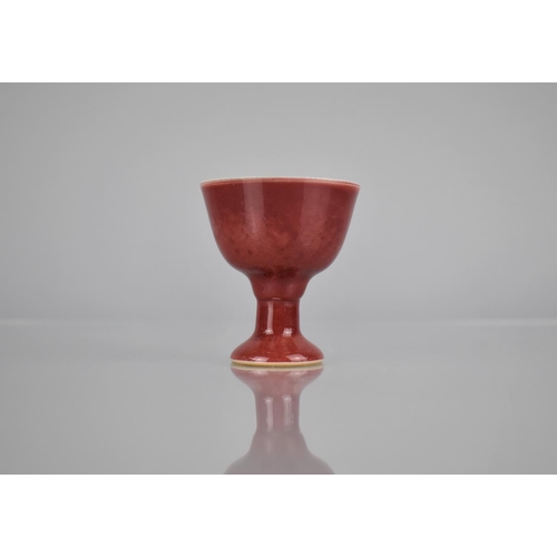 112 - A Chinese Porcelain Sang De Boeuf Stem Cup with Six Character Mark to base, 6.5cm high