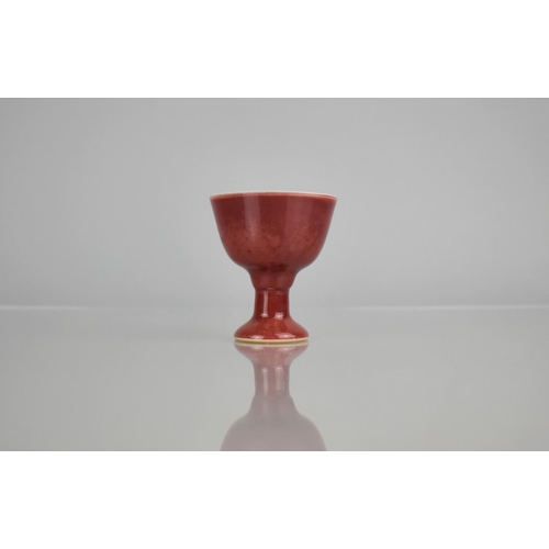 112 - A Chinese Porcelain Sang De Boeuf Stem Cup with Six Character Mark to base, 6.5cm high