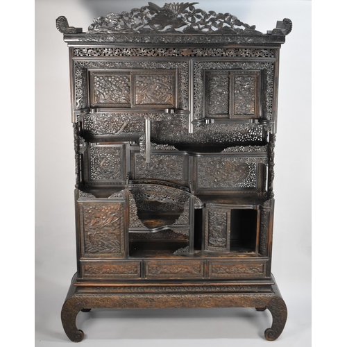 190 - An Impressive 19th/20th Century Chinese Ornately Carved Hardwood Cabinet. Carved and Pierced Panels ... 