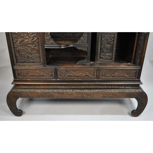 190 - An Impressive 19th/20th Century Chinese Ornately Carved Hardwood Cabinet. Carved and Pierced Panels ... 