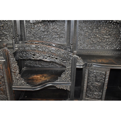 190 - An Impressive 19th/20th Century Chinese Ornately Carved Hardwood Cabinet. Carved and Pierced Panels ... 