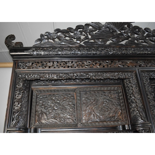 190 - An Impressive 19th/20th Century Chinese Ornately Carved Hardwood Cabinet. Carved and Pierced Panels ... 