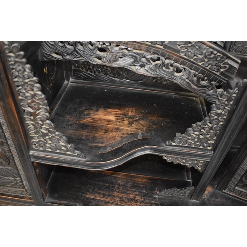 190 - An Impressive 19th/20th Century Chinese Ornately Carved Hardwood Cabinet. Carved and Pierced Panels ... 