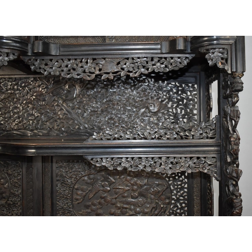 190 - An Impressive 19th/20th Century Chinese Ornately Carved Hardwood Cabinet. Carved and Pierced Panels ... 