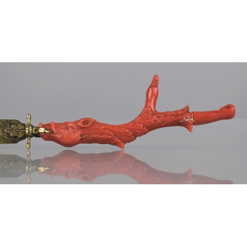 334 - A 19th Century Coral Handled and Unmarked Gilt Metal Page Turner, The Handle of Claw Form incorporat... 