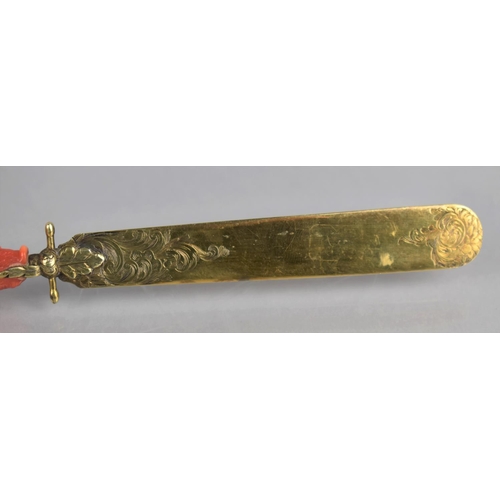 334 - A 19th Century Coral Handled and Unmarked Gilt Metal Page Turner, The Handle of Claw Form incorporat... 