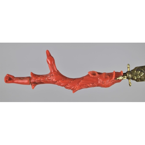 334 - A 19th Century Coral Handled and Unmarked Gilt Metal Page Turner, The Handle of Claw Form incorporat... 