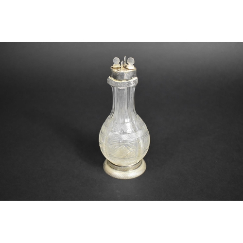 328 - A Victorian Cut Glass and Silver Mounted Four Section Cruet of Bottle Form, 15cms High Complete with... 