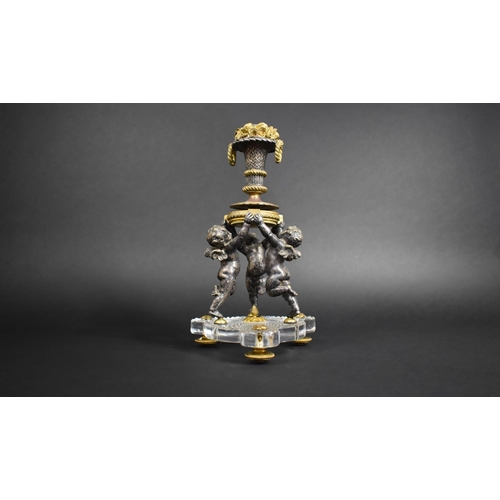 326 - A Late 19th/Early 20th Century Bronze and Cut Glass Cherub Centre Piece, Baccarat Hobnail Cut Trefoi... 