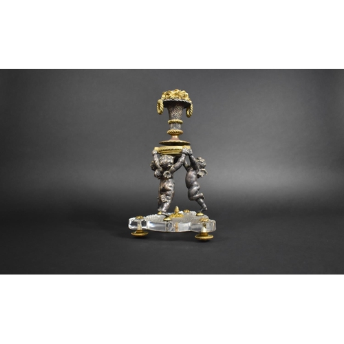 326 - A Late 19th/Early 20th Century Bronze and Cut Glass Cherub Centre Piece, Baccarat Hobnail Cut Trefoi... 