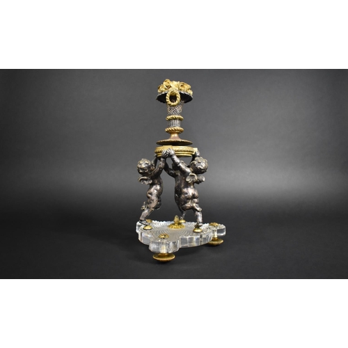 326 - A Late 19th/Early 20th Century Bronze and Cut Glass Cherub Centre Piece, Baccarat Hobnail Cut Trefoi... 