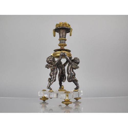 326 - A Late 19th/Early 20th Century Bronze and Cut Glass Cherub Centre Piece, Baccarat Hobnail Cut Trefoi... 