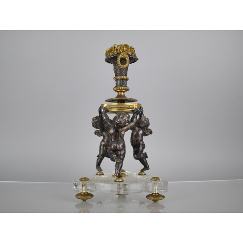 326 - A Late 19th/Early 20th Century Bronze and Cut Glass Cherub Centre Piece, Baccarat Hobnail Cut Trefoi... 