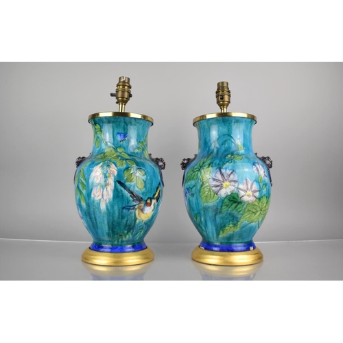 307 - A Pair of French Majolica Lamps of Baluster Form decorated with Flowers, Birds and Butterflies on Bl... 