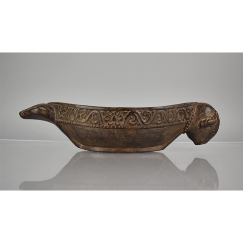 265 - A Carved Wooden Water Drinking Bowl of Kharal Form , Boat Shaped with Buffalo Handle and Muridae Pou... 