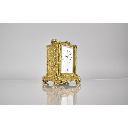 261 - A Late 19th Century Gilt Brass Cased Carriage Alarm Clock by Hottot Paris, The Case with Moulded Vin... 