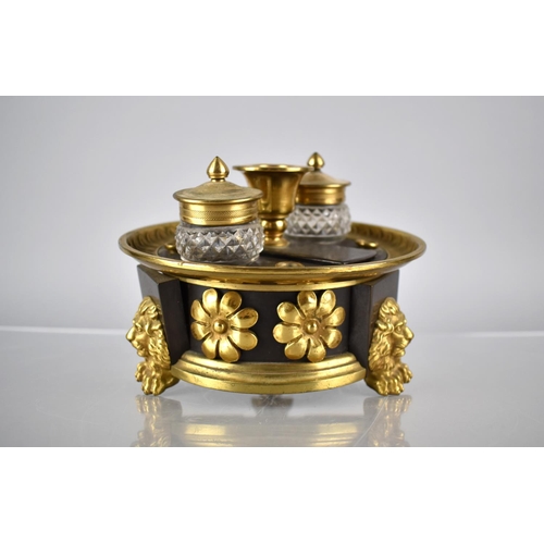 232 - A Regency Bronze and Gilt Ink Stand of Circular Footed Form complete with Two Cut Glass Inkwells Rai... 